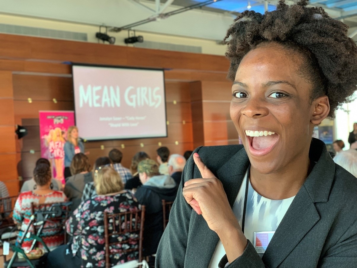 Sydni Jean in front of Mean Girls performer at Broadway announcement party