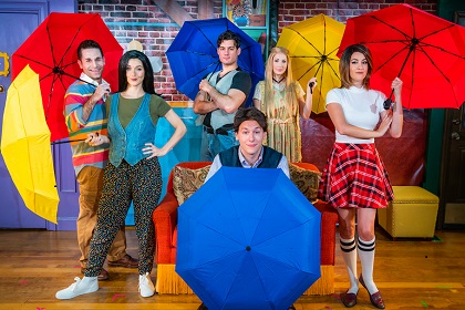 Friends show signature cast with umbrellas