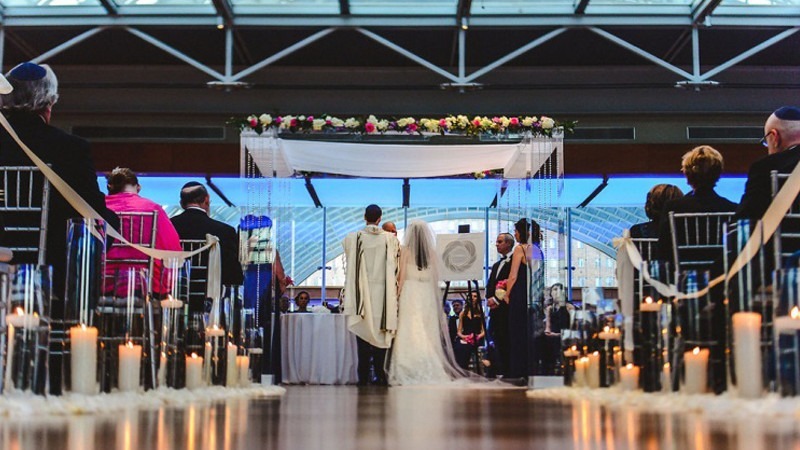 A traditional Jewish wedding being held at the Kimmel Center's  Hamilton Garden.